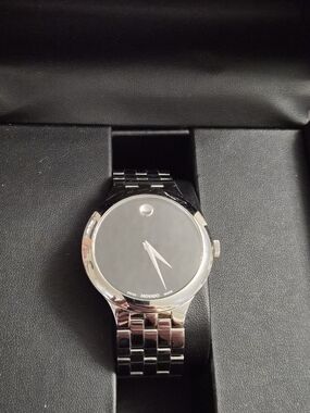 Movado Stainless Steel Watch — Silver Back Case